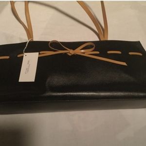 Cleo & Patek black bag